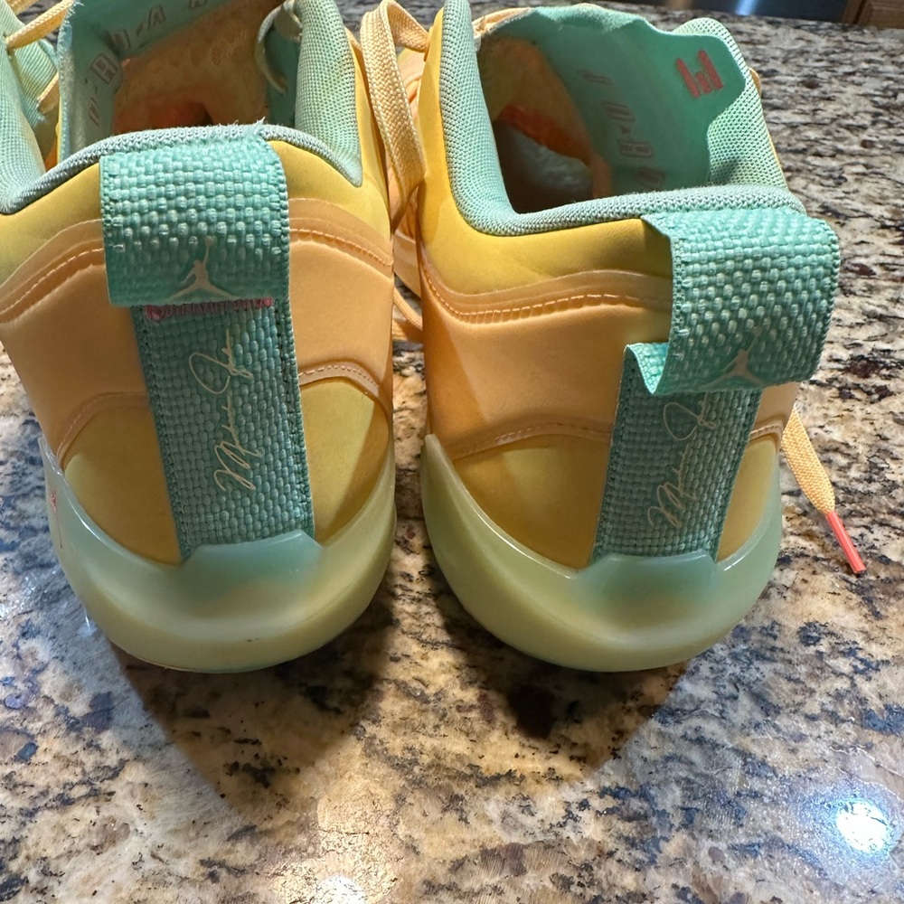 Jordan Vibrant Yellow and Green Athletic Shoes with Textured Pull Tabs